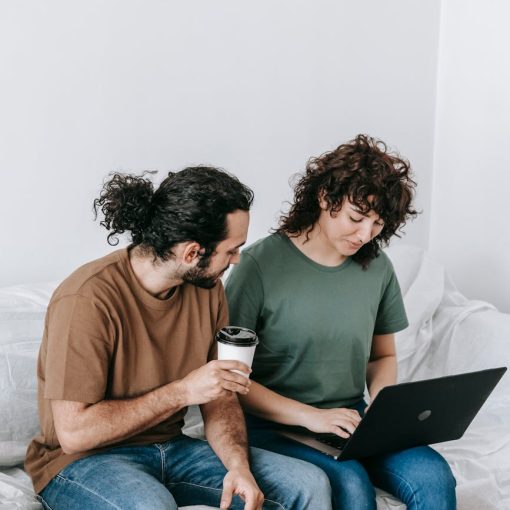 couple using a computer laptop