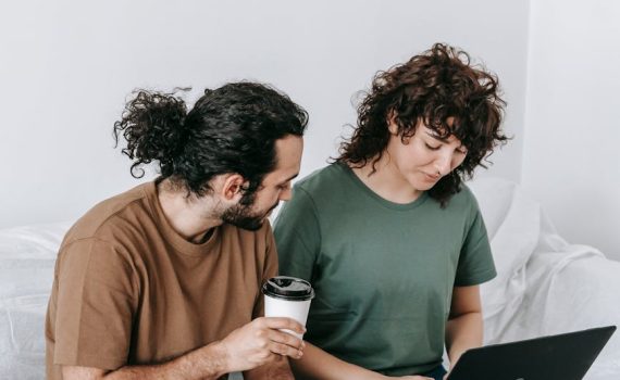 couple using a computer laptop