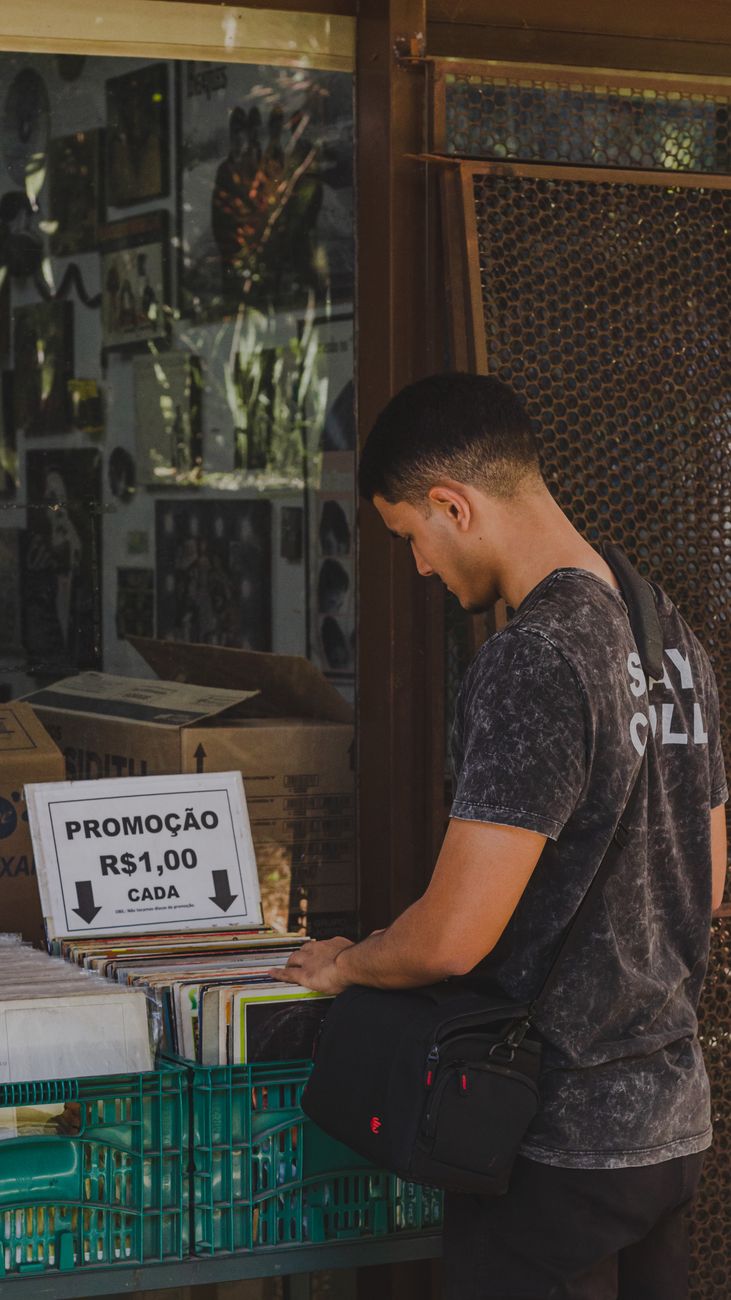man shopping on street